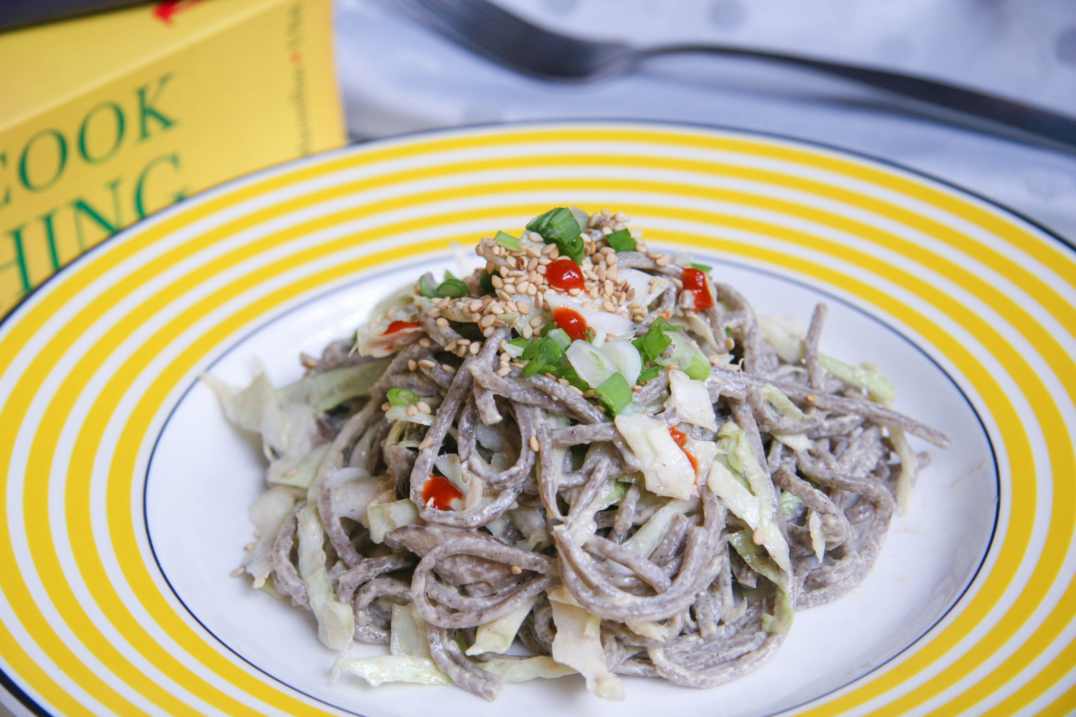 soba noodle salad on plate